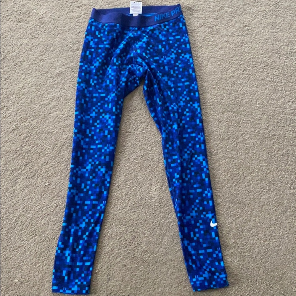 Nike Blue Pixel Pattern Leggings size M excellent condition. Snug fit.